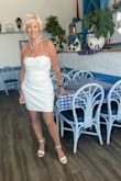 I love this strapless dress. It fits well and is very comfortable. At 74, it's still fun to dress up and receive compliments. Hubby likes it too! - Darrel S.