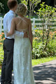 I loved this dress and the material of it was so comfortable! It was perfect for my wedding and photographed so well. I wore shoes that are about 1.5 inches and it made the dress a perfect length to just graze the floor. - Alyssa M.