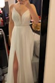 The material is soft and flowy, and the dress is super easy to move around in. - Alyssa M.