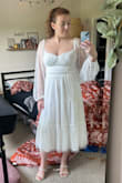 I love the texture of this dress! I'm wearing it to my courthouse wedding coming up! I am between small and medium sizes but went with the small since the material is stretchy. I wish the busy had a little more support but other than that it's great! - Kailey P.