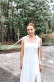 The dress fit true to size, was super comfortable, and the bows on the straps gave the dress a timeless look. It was pretty long on me, dragged a bit on the floor even with heels on. - Katherine D.