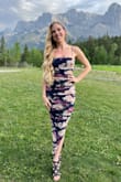 I bought this dress based off reviews and it is one of my top favorites by far! It's super stretchy and the ruching gave my body a nice hourglass figure.
I usually don't go for bodycon dresses because it's hard to find ones that fit in all the right places, but this one comes very small and there's so much stretch to it that it hugs nicely everywhere. It was also very easy to move and sit in. The material is very breathable, so it was perfect for a hot outdoor wedding! - Andrea L.