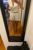 Exchanging for a small! Top is a little more baggy than I would like it to be in the medium. In this photo, I am holding about 3 inches of fabric behind my back so I am hoping that is what the small will look like - Kayla P.