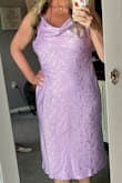 I ordered this dress and a couple of others to wear to a wedding.  This dress is so pretty and comfy and would hug  the right areas if I had ordered the right size.  I have lost a little weight and should have went with the large so I feel it's a little big on me. The material is light but has no stretch and the color is as pictured.  I didn't wear this dress to my event because liked another Lulu's dress better but I would definitely wear this if I had picked the right size. - LISA A.