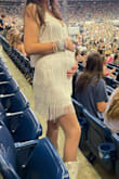 Super cute for a one-time wear. Wore it to the era's tour. I'm tall so it was very short on and me I'm 4.5 months pregnant. Very stretchy. Quality is just OK. One of the straps randomly broke when I was standing in line for merch. We were able to tie it back on. Normally wear a small but got a medium due to baby bump - Jayden S.