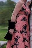 I am on the shorter side and I barley had to hem this! It was almost a perfect fit. It was a beautiful dress perfect for the wedding. The material was silky. It was definitely more pink than the photo lead it to be. - Hillary G.