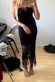 This dress is so sexy and cute!! Note that it does have a liner inside. It's easy to miss, but be sure to slip into the lined section because it's quite see-through without it (especially in sunlight)! - Georgia K.