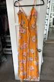 I like the color and wrap style of this dress, but unfortunately, I couldn't get the sizing right. I ordered a medium to start with, and I'm smaller on the top than the bottom---which would work fine with a wrap dress normally, but this one ran large on the top so there was excess fabric at the back and the bust didn't look right in the front. I exchanged it for an extra small because that was the only size left, and it was a better fit but didn't leave any room for a strapless bra. Probably a small would have been perfect but there were none left available in stock. The bottom of the dress is heavier, it has a more formal feel to the dress than I expected from the picture. It has a heavy silk under-lining and see-through over-layer see-through crepe texture. I wouldn't probably wear this to anything less formal than a wedding which doesn't make it super functional for me to re-wear. - Sam B.