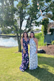I agree with other reviewers that it is definitely long. I normally wear an XS in Lulus dresses. It was a tad tight in the back. Overall a good choice for an outdoor spring wedding. Good quality material as always! - Brooke G.