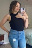 This bodysuit is super sexy yet simple ! I loved the quality and got so many compliments ! Pairs well with just about any kind of bottoms. A must buy! - Audrey P.