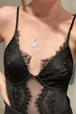 This was super cute for a night out, but a few qualms: the lace was not even on each side, which made it look cheap; the bodysuit was too short to clip at the bottom so I just had to tuck it into my skirt. - Heather L.