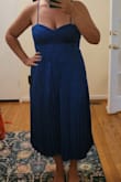 The fabric ok this dress is gorgeous. Lovely color and pattern. The fit just wasn't there for me. It made my hips look boxy, and the pleats around the zipper don't lay well. I ended up returning it. - Leslie F.