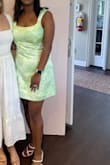 I worth this dress to a bridal shower and it was perfect! It fit true to size and I got lots of compliments on the color of the dress. - Helen A.