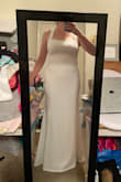 My first time ordering and trying on something for my wedding and I am instantly in love! It has plenty of stretch and the length is perfect for my tall height! Wearing a shapewear thong helps with my mommy of 3 belly. I am size 8. - Alexandra C.