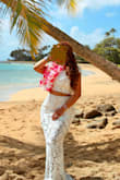 I purchased this for my 10th-anniversary photos in Hawaii. It was breathable, comfortable, and although little stretch it felt great. I am short so I had to get it hemmed like other reviews advised. It fit it all the right places and was still forgiving of my 40+, Mom of three tummy! This can be worn for a variety of events. I'm wearing it again to an all-white dinner soon! - Nikki L.
