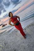Loved this for a beach dinner in Jamaica. Material was thick, but not too hot. I did wear shaper underwear because I was afraid it would show a few bumps/jiggle, but I still felt/looked secure in this. Will likely buy another color. - Nikki L.