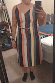 I bought this in a size M and changed it to a size L. The size M did not fit at all, the size L fitted, but it still ran small and did not give me the look I was hoping for. The material is good, but it is very tight on the bust area. - Gabriela S.