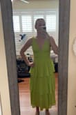 I ordered the purple in a size medium and lime in a size small. The lime arrived first and fit perfectly! The side zipper was just a little tight. I returned the purple because it was a little big in the chest but fit more comfortably in the waist. I could have kept it and had the straps taken in a bit. - Anne M.