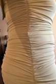 I ordered this dress for a wedding. When I tried it on, the the seams attaching the top panel to the bottom panel doesn't even line up and it wasn't even sewn on straight. It's extremely obvious, especially on the right side of the dress. The back zipper also doesn't lie flat and keeps buckling. Extremely disappointing. - Sahar M.