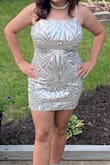 Worked well with a normal strapless bra. Really cute and fun. Wore it with Converse. - Eleanor C.
