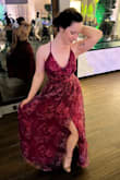This dress is gorgeous! I am on the shorter side and got it hemmed- also slightly stitched the neckline and the slit as they were both pretty revealing. The color was so vibrant and beautiful. It was tight in the bodice but I'm fairly small-chested, so this worked well for me, but bigger busts should size up. - Shannon M.