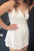 I love all of Lulus and their clothing. This romper became my favorite item of clothing I've ever owned, but the strap broke after wearing it for about 4 hours. I will definitely try to fix it because I love it so much, but I hate that it broke in the first place, especially with it being this price and breaking so soon. Also, any sort of bra/pasties/etc showed through, so I couldn't wear anything underneath, but that wasn't too big of an issue. It's super cute and VERY comfortable. I'd get it in all of the colors if there were more. - Emily E.