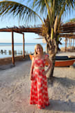 Stunning dress perfect for a beach holiday. I am 5'1" and had to shorten it by 4 inches. Even with 3 inch wedges, the shortened length was just right. Otherwise a size small fit perfectly. Wish Lulu's had petite sizes for us shorter girls! - Paulina P.