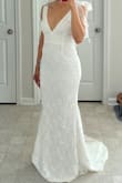 I'm not really a fan of lace but this one was beautiful. It was soft and great quality. I just wasn't a fan of the tulle straps because they came wrinkled and I didn't want to deal with getting rid of them so they could lay nicely on my shoulders. It's true to size based on my measurements and shows off my curves. Overall, I didn't choose it because it wasn't my type. - Jennycka B.