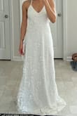 This dress has amazing detail and the sequins make it shiny, and tho I loved it, it didn't give me that bridal feel. I also don't like how thin the straps are and wasn't confident that it would hold up the entire wedding day because there is some weight to the dress. I love the back tho. I'm small chested so I would've needed to either alter or use a sticky bra to boost my girls to fill the front - Jennycka B.