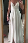 The shape of the dress is great! I hate that you can see the pockets through the dress, the dress is too thin to have pockets IMO if you use them at all you're gonna see whatever you put in them. I don't love that it's like a wrap dress, meaning if the wind blows everyone is gonna see everything underneath. - Cathi R.