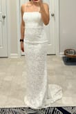 This was a well made dress; however, it runs small so I would go up one size. I have a small chest and it was tight. It hugs your figure and looks simple and elegant but had to return because I loved other dresses more. The straps are also adjustable. - Jennycka B.
