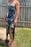 This dress is very flattering. It fits well and I received many compliments. - Barb B.