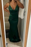 I love this dress! After carefully reading the reviews I decided to go with size XS and I'm glad I did as it's not tight and a small definitely would have been too loose. It fits me perfectly and is super flattering. The material is very smooth and I love the color and the strappy back. If I wore super high heels I wouldn't need to hem it but I'm going to be wearing it with 4 inch heels and it is still a bit too long. I love this dress - some things from Lulus are hit or miss but this one is definitely a hit. - Marina V.