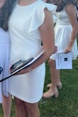 My 13-year-old 8th grade graduate looked stunning and received so many compliments. She is 5'7" and this was the perfect length, not too tight, very appropriate for her age and the occasion. Highly recommend! - Marissa C.