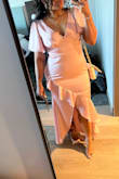 This dress is just as advertised. It's a very pretty blush, pink color. The dress is lined so it feels very high quality. The fabric is buttery smooth. This dress has NO stretch but it true to size. It may not work for larger busted women since it doesn't stretch much however, it really accentuates your curves and bust! I really loved it and received a lot of compliments. Dress will need to be steamed really well. It comes very wrinkled in the packaging. - Alejandra P.