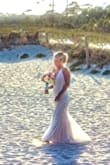 The dress was beautiful! I was very pleased and got so many compliments. Perfect for my beach wedding. - Tonya H.