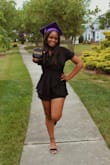Bought this for my graduation and it was so cute!! I was going back and forth between a small and medium but I ended up going with a small and it fit perfectly! It was a little frustrating to put on, but once I learned it was so much easier. - Asianna J.