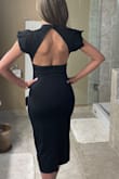 This dress molds to your body perfectly. It's beautiful, elegant and sophisticated! I love the material- very comfy! I love this dress!!! - Lilian S.