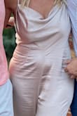 I wore this for my wedding shower and absolutely loved it! It was so comfortable and cute! You don't have to wear a bra because the material near bust is double lined. It's low in the back in an elegant manner and the length was perfect for sandals or heels! The material was so comfortable and elegant! I will definitely purchase from here again and shipping was quick. - Tina G.