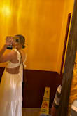I purchased this dress to wear for wedding dress shopping. Something a little casual and easy to get in and out of. The bust is double lined so I just wore pasties underneath which was ALSO super helpful for wedding dress shopping. Since it ties in the back, you can choose your fit. I'm a 34 and had plenty of material left over from the bow I made. It's easy to tie yourself too! Whole dress is lined and not see through at all! Love that it's casual so I can wear for other non-wedding related occasions as well! - Rebecca R.