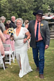 It was a bit long for my 5'1" frame, but paired with a great 4 inch wedge, it was perfect! Danced the night away in it.
At 55, this wedding was a fabulous day and I felt beautiful in this dress. Perfect coverage for the tops of my arms with full open back! - Anita B.