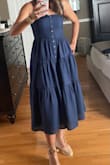 Cute summer dress. Runs a little big especially if you have a small chest. A word of warning, it's hard to iron the wrinkles out and even when ironed, there are still wrinkled. It may be the style of fabric (like parachute). Still cute but just don't expect a perfectly ironed look. - Cathy B.