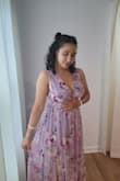 I'm small top and bottom heavy (34B). Had to get the height and shoulder straps shortened. I'm 5'2 and was wearing 4" heels. The flow, material, and color are beautiful. - Madhavi C.