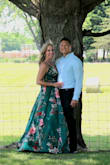 Beautiful A-line dress. Very feminine gown that blows in the wind and the colors pop. Wore 3-inch heels. No alterations needed. - Shannon S.
