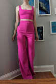 I purchased this for a Barbie party and am very pleased! The top fits perfectly (no strap shortening necessary, which is rare for me), and the pants are long enough to accommodate a tall heel. I love that the pants are a true high rise, sitting just above my belly button. And the fabric feels decent for the price and is comfortable to wear. - Sonia O.