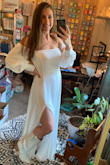 I got this dress for my engagement photos and bachelorette party and then I seriously considered wearing it as my wedding dress too! It's SO FLATTERING! I normally wear a M or size 6, but I would say this dress definitely runs a little bit big. I'm 5'6 and it is pretty long too, even with heeled shoes. I think if I had a larger chest it would fit a little bit better, but it will still be perfect as is for my photo shoot and Bach party! Definitely recommend! - Hailey L.