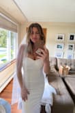 I had wanted to get a wedding dress that was simple, classic, and comfortable. This dress completely fits the bill. Zero alterations and I felt so beautiful. An instant winner. - Lauren M.