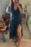 I went up a size from M to L after reading other reviews and I'm glad I did. The L fit perfectly and definitely no stretch where it zips up on the side. This dress is so flattering. - Giselle E.