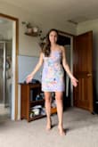 I didn't end up wearing it at the wedding because I went for a more formal option but I did bring this as a backup and I plan to keep it and wear it to another occasion this summer. I have super wide hips and am busy, despite being on the shorter side, and this dress fit me well. Super cute and simple with a nice lavender color. - Renee W.
