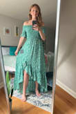 This dress is pretty and light weight! I ordered a size down, I am usually a size small, but based on the reviews I was reading, I went down to an XS. An XS fits perfectly for this dress! The color is really pretty- and the length is perfect. My only issue is that the fabric is a bit itchy around the chest area. - Emily C.